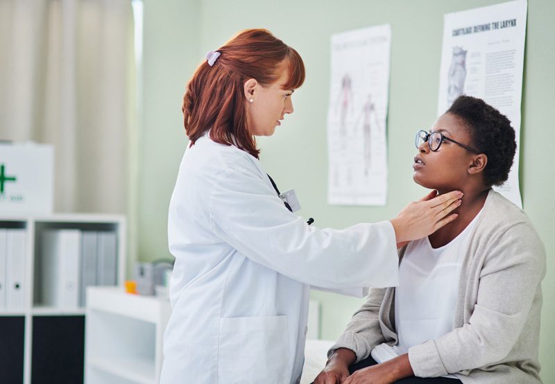 Doctor-examining-patient-for-submandibular-gland-excision