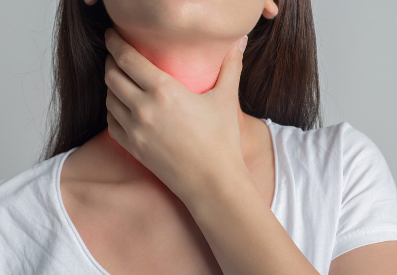 Woman-in-pain-from-thyroid-nodules