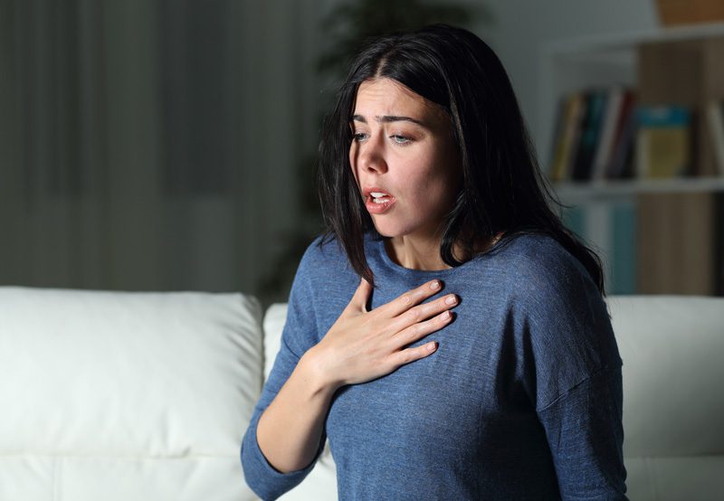 Woman-struggling-with-breathing-&-needing-turbinoplasty