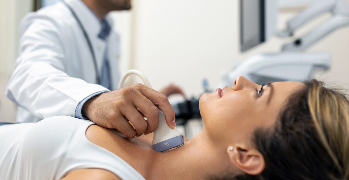 Woman-undergoing-ultrasound-for-thyroid-nodules
